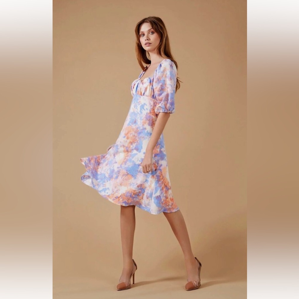 BCBGeneration “Molly puff sleeve” knee-length, open back, patterned dress